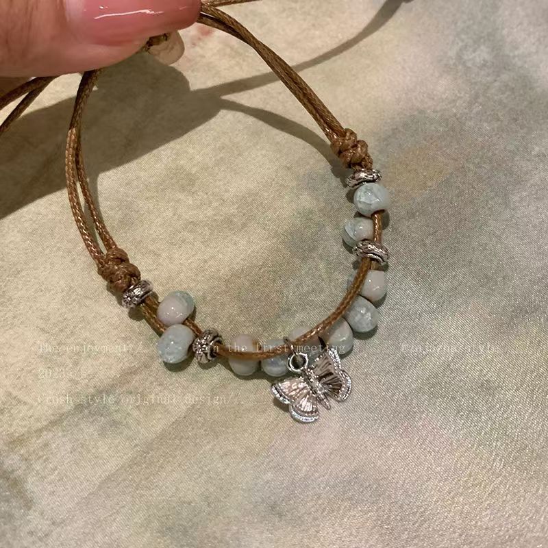 Chinese butterfly ceramic beaded woven hand rope niche summer new retro Guochao ethnic style hand jewelry
